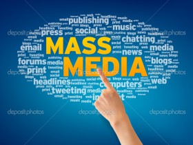 Finger pointing a an Mass Media Word Cloud on blue background.