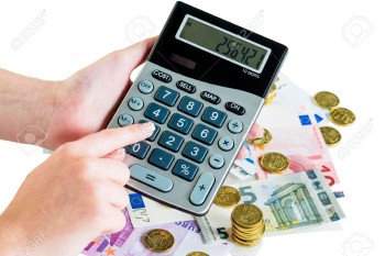 26163007-hand-with-calculator-and-bills-symbolic-photo-for-turnover-profit-taxes-and-costing-Stock-Photo